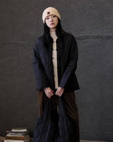 Doublure à bouton noué