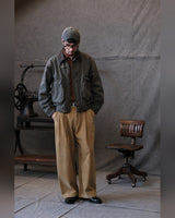 Double-pleated Corduroy Trousers in tan – worn by model