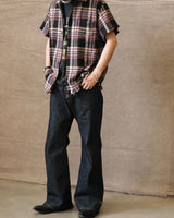 Flared Raw Denim Jeans