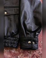 80s Panelled Leather Blouson – close-up of snap cuff and elasticated hem