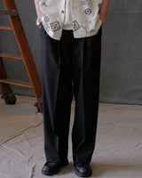 Black high-waisted pleated wool-blend trousers – view 2