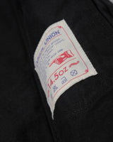 Black Selvedge Type II Denim Jacket in black – close-up of 15.5oz label
