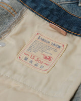 Distressed Redline Selvedge Jeans in vintage wash – close-up of 15.5oz label
