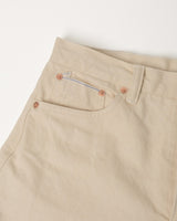 Ecru Slub Selvedge Straight Jeans in ecru – close-up of coin pocket and copper rivets