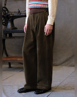 Double-pleated Corduroy Trousers in olive – worn by model
