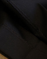 Black high-waisted pleated wool-blend trousers – view 7