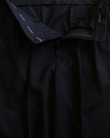 Black high-waisted pleated wool-blend trousers – view 9