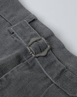 Washed Herringbone Pleated Trousers in charcoal – close-up of side adjuster